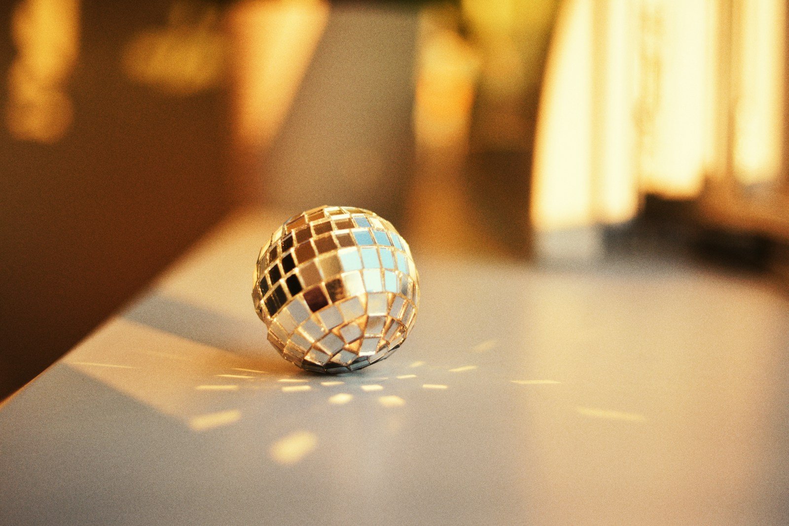 A ball sitting on top of a white table